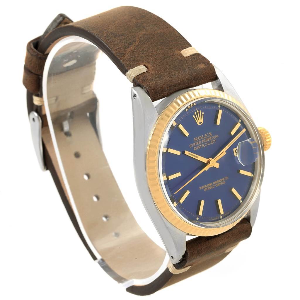 The image shows a side view of a Rolex Vintage Collection 1601 Men's Steel and Gold (two tone) Blue Dial 1601 Men's Steel and Gold (two tone) Blue Dial Datejust watch, displaying the watch face, bezel, and leather strap.