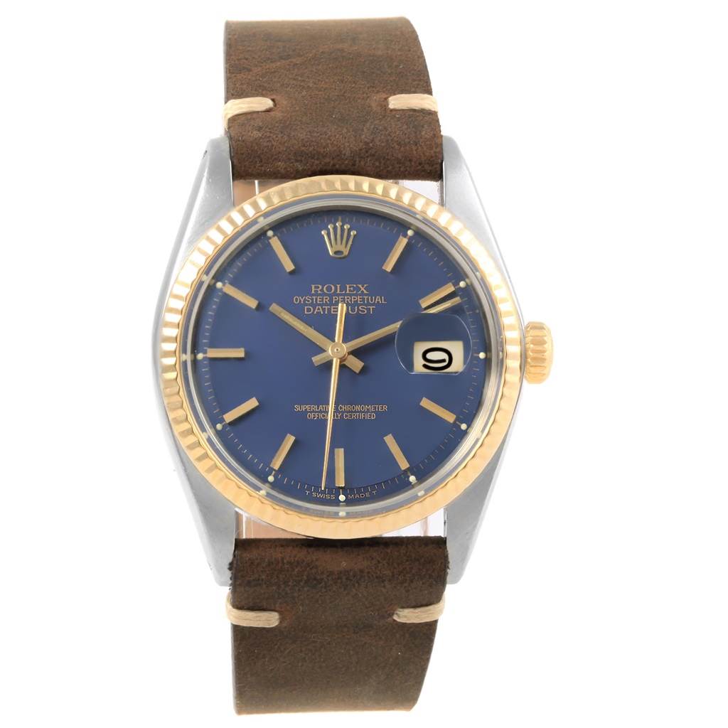 The image shows a front view of a Rolex Vintage Collection 1601 Men's Steel and Gold (two tone) Blue Dial 1601 Men's Steel and Gold (two tone) Blue Dial Oyster Perpetual Datejust with a blue dial and brown leather strap.