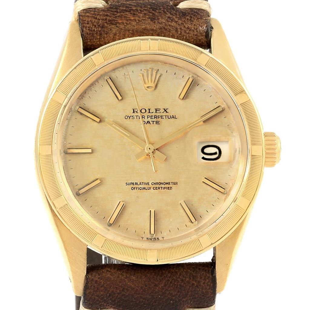The image shows a frontal view of a Rolex Vintage Collection 1501 Men's Yellow Gold Champagne Dial 1501 Men's Yellow Gold Champagne Dial model watch, displaying the dial, hands, date window, and part of the strap.