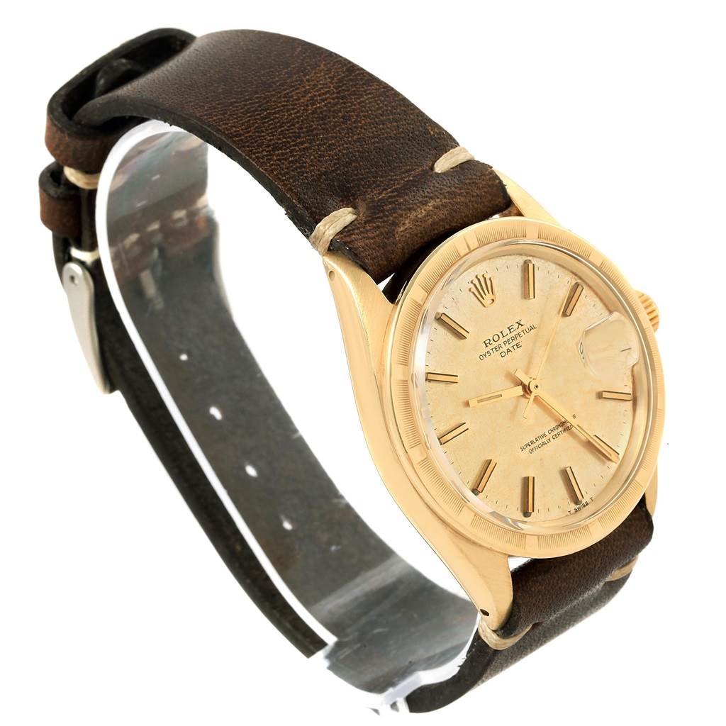 The Vintage Collection Rolex watch is shown at an angle displaying its face, dial, leather strap, and part of the clasp.