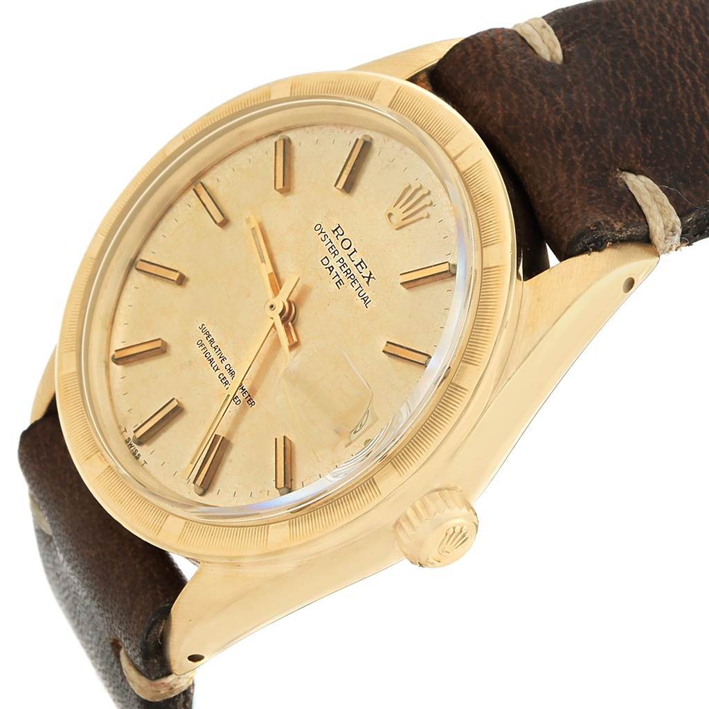 The image shows a side view of the Rolex Vintage Collection 1501 Men's Yellow Gold Champagne Dial 1501 Men's Yellow Gold Champagne Dial watch, focusing on the face, crown, and leather strap.