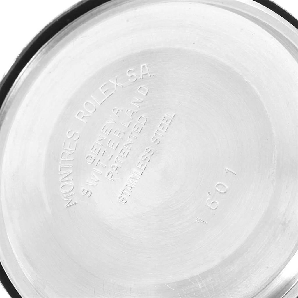 This image shows the back case cover of a Rolex Vintage Collection 1601 Men's Stainless Steel Black Dial 1601 Men's Stainless Steel Black Dial model.