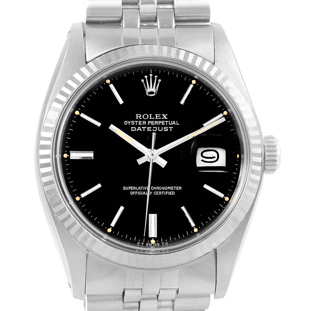 This image shows a Rolex Vintage Collection 1601 Men's Stainless Steel Black Dial 1601 Men's Stainless Steel Black Dial Datejust watch, featuring the dial, hands, date window, and part of the bracelet at a frontal angle.