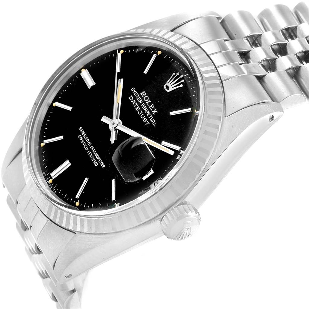 The image shows a Rolex Vintage Collection 1601 Men's Stainless Steel Black Dial 1601 Men's Stainless Steel Black Dial Datejust watch at an angled view, displaying its face, bezel, and part of the bracelet.