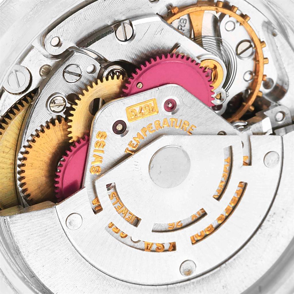 The image shows a close-up view of the internal movement mechanism of a Rolex Vintage Collection 1601 Men's Stainless Steel Black Dial 1601 Men's Stainless Steel Black Dial watch.
