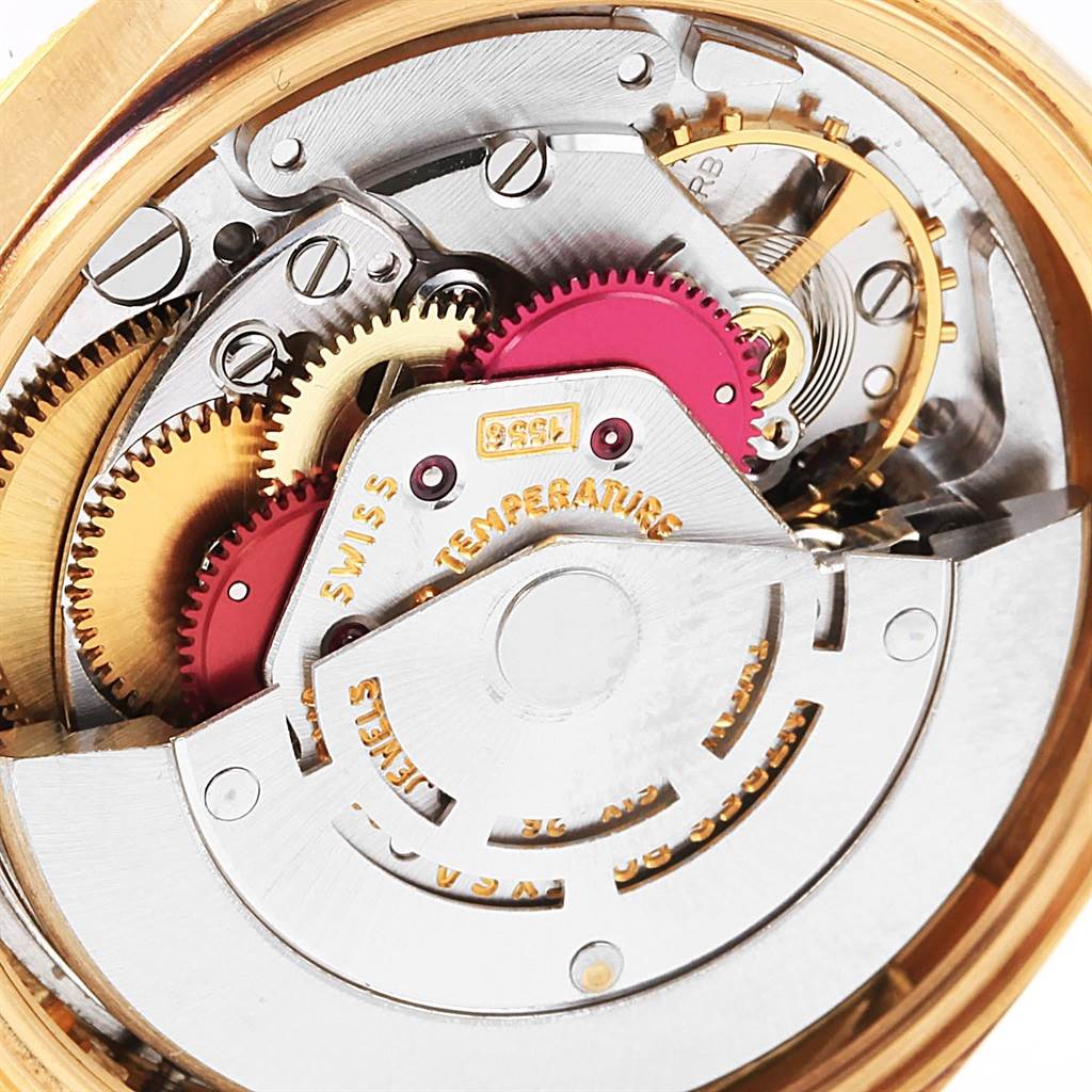 This image shows a close-up of the movement mechanism of a Vintage Collection model by Rolex.