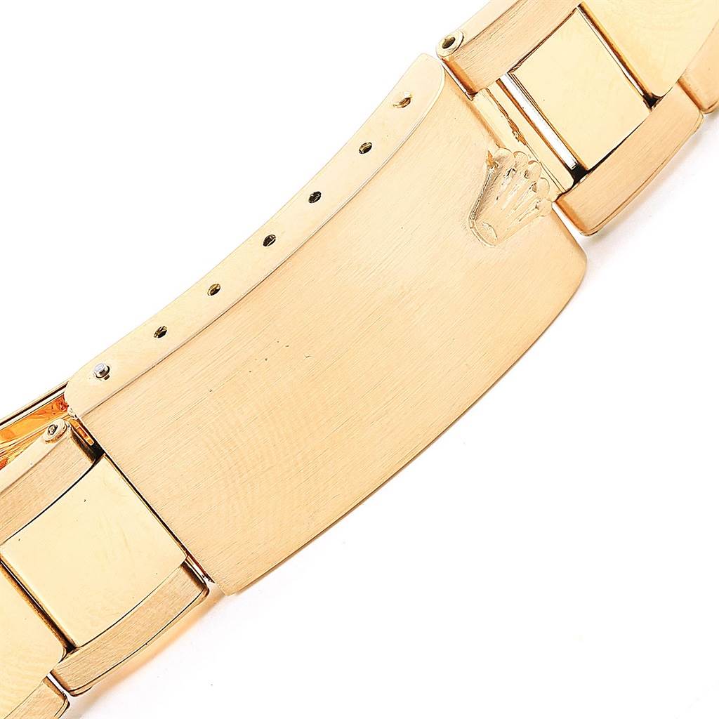 The image shows the clasp and part of the bracelet of a Vintage Collection watch by Rolex, viewed close-up.