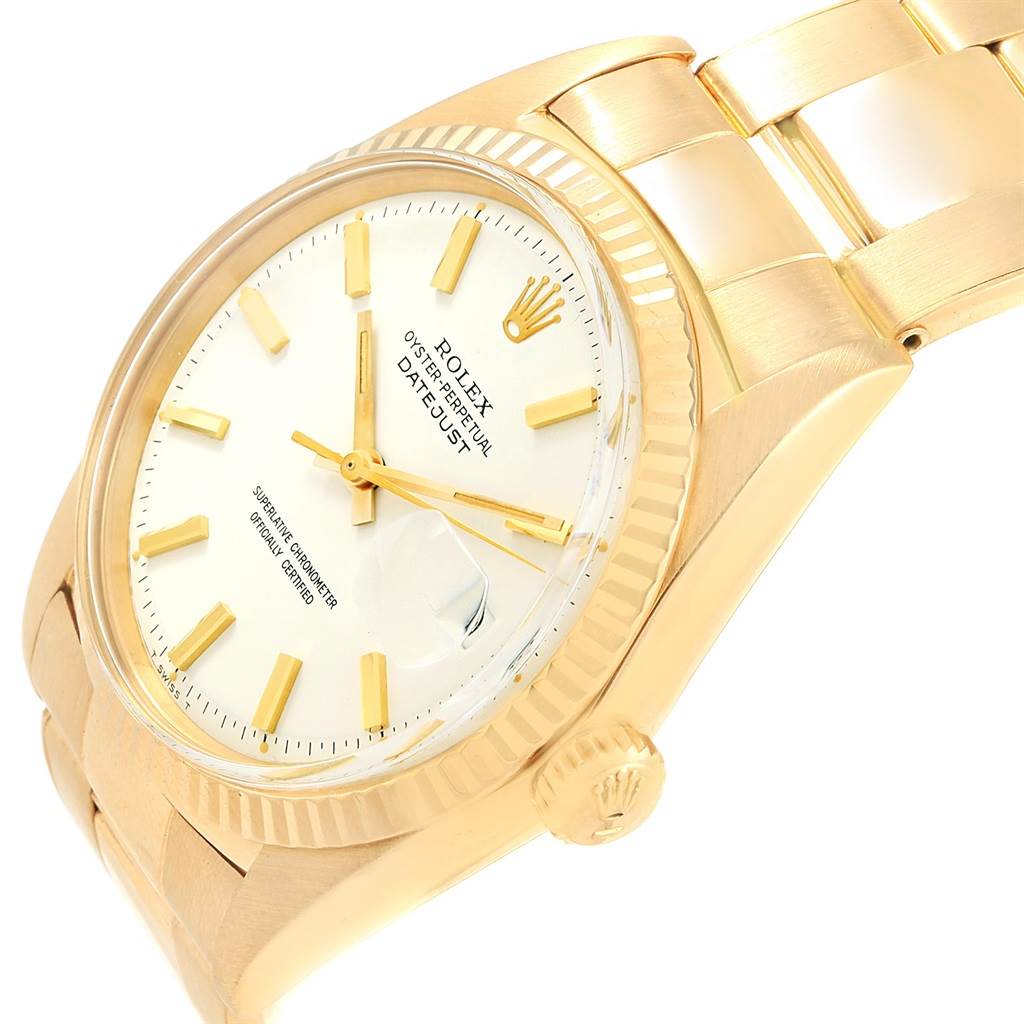 The image shows a close-up angle of the Rolex Vintage Collection 1601 Men's Yellow Gold White Dial 1601 Men's Yellow Gold White Dial watch, highlighting the face, bezel, and partially the band.