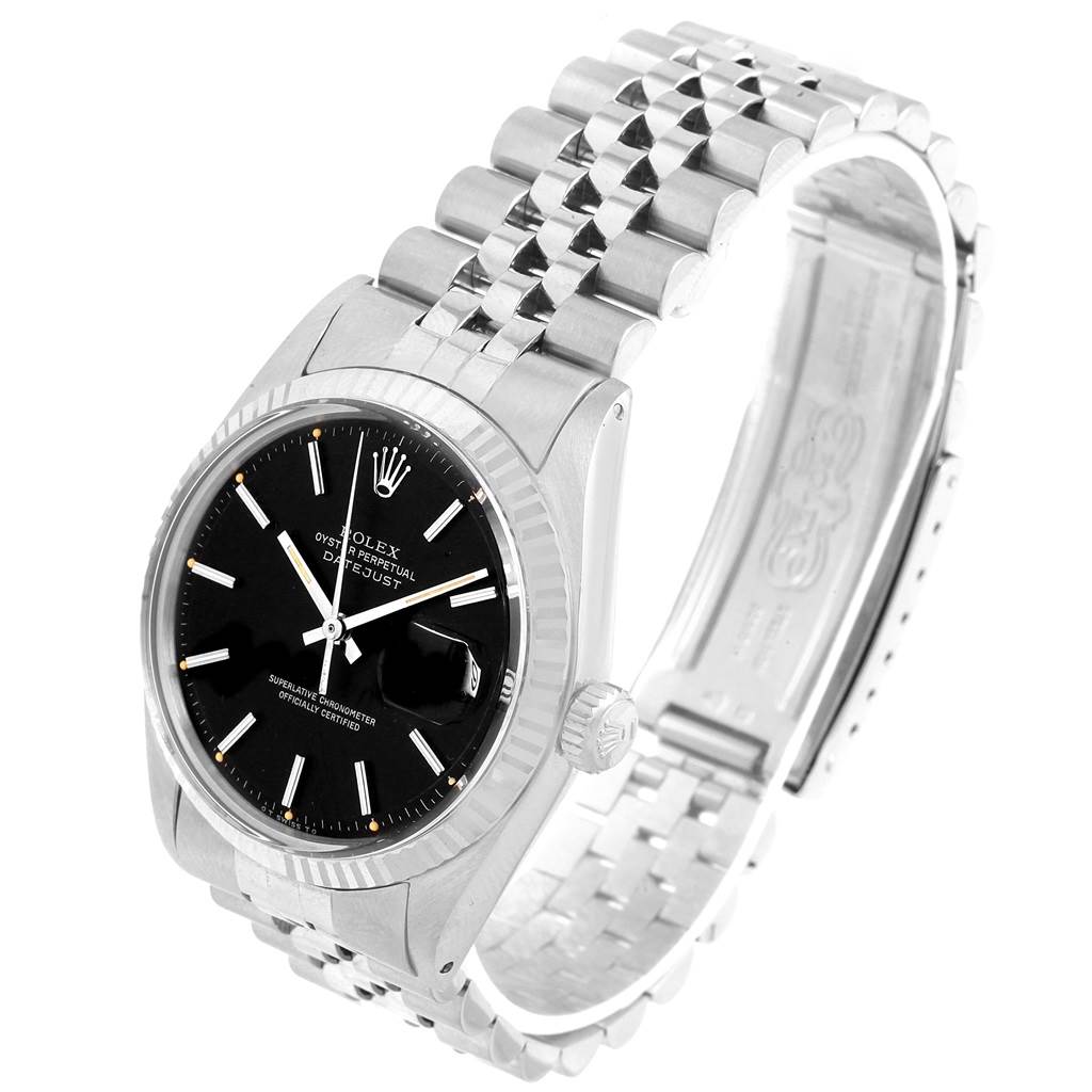 This image shows a Rolex Vintage Collection 1601 Men's Stainless Steel Black Dial 1601 Men's Stainless Steel Black Dial watch at a slight side angle, highlighting the black dial, fluted bezel, and jubilee bracelet.