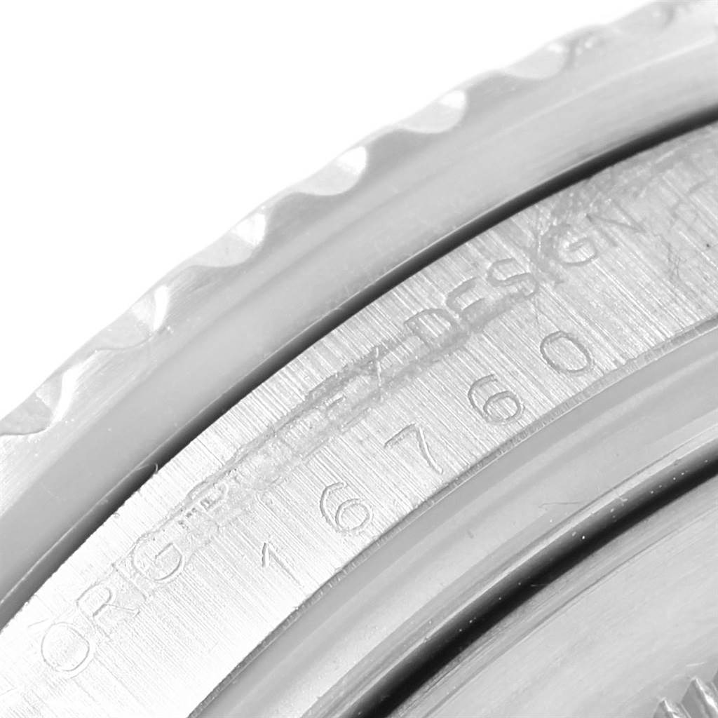 The image shows a close-up of the side engraving on the bezel of a Rolex Vintage Collection 16760 Men's Stainless Steel Black Dial 16760 Men's Stainless Steel Black Dial watch model 16760.