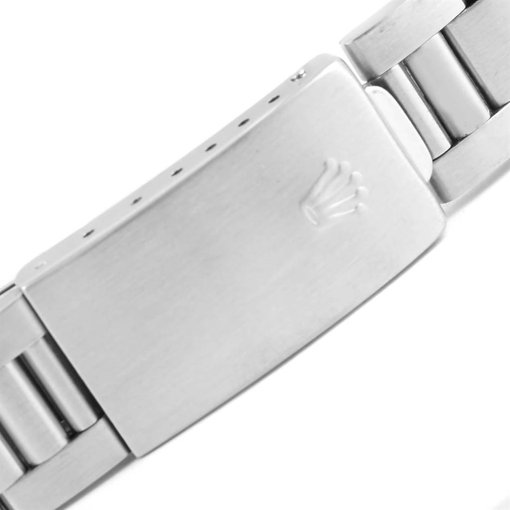 This image shows the clasp and part of the bracelet of a Rolex Vintage Collection 1500 Men's Stainless Steel Silver Dial 1500 Men's Stainless Steel Silver Dial watch from a close-up angle.