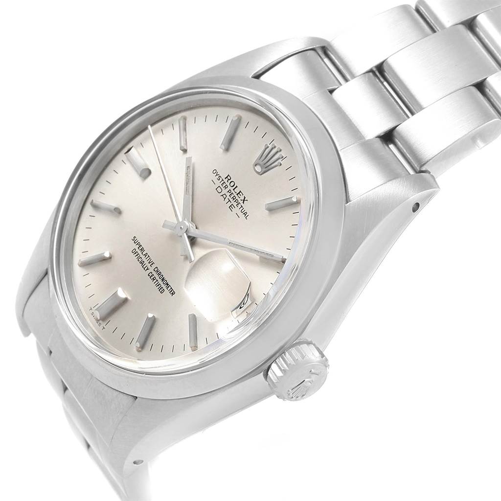 The Vintage Collection Rolex watch is shown from an angled side view, displaying the face, crown, and part of the bracelet.