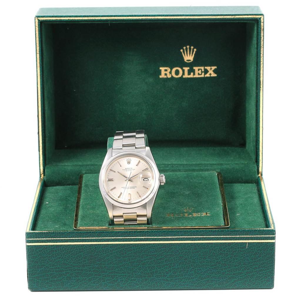The Rolex Vintage Collection 1500 Men's Stainless Steel Silver Dial 1500 Men's Stainless Steel Silver Dial watch is front-view, displayed in its branded green box.