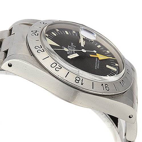 The image shows a side angle of the Rolex Vintage Collection 1655 Men's Stainless Steel Black Dial 1655 Men's Stainless Steel Black Dial watch, highlighting its bezel, dial, and part of the bracelet.