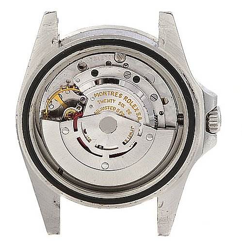 The image shows the back view of a Rolex Vintage Collection 1655 Men's Stainless Steel Black Dial 1655 Men's Stainless Steel Black Dial model, displaying its internal mechanical movement components.