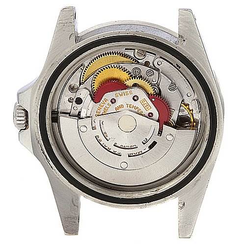 This image shows the open back of a Rolex Vintage Collection 1655 Men's Stainless Steel Black Dial 1655 Men's Stainless Steel Black Dial watch, revealing its internal mechanical movement.