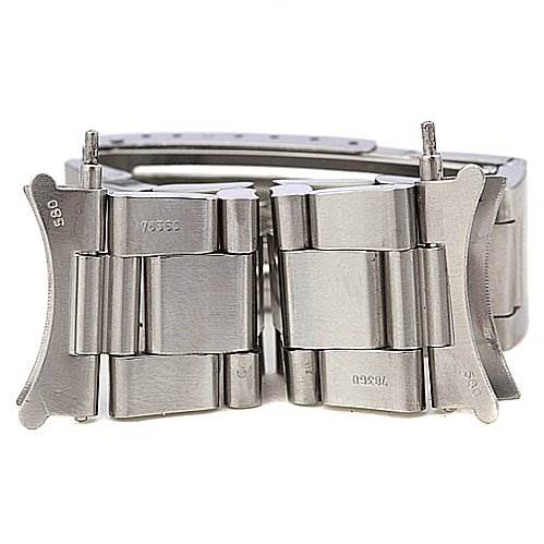 This image shows a close-up of the clasp and links of a Vintage Collection model by Rolex.