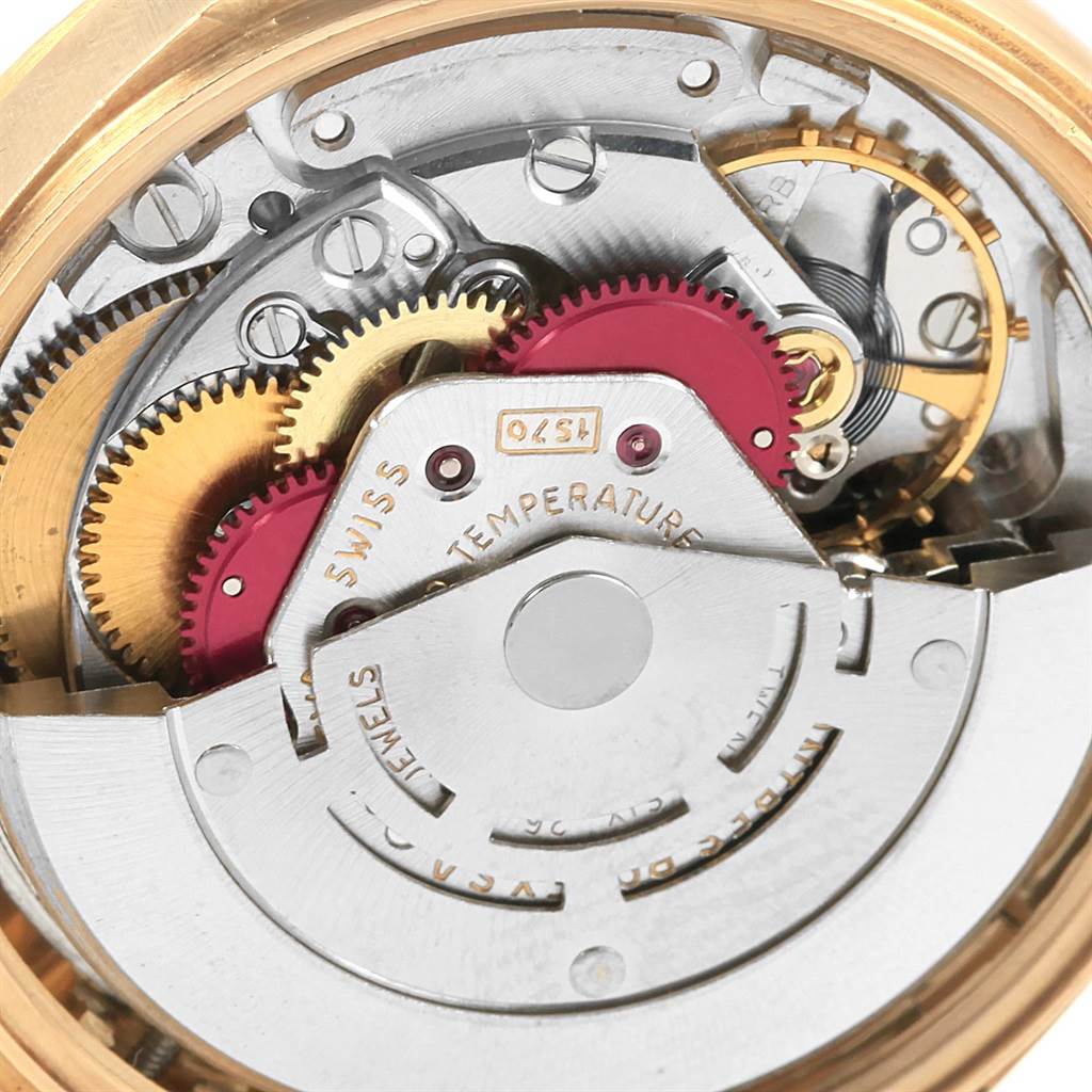 This image shows the internal mechanism of a Rolex Vintage Collection 1803 Men's Yellow Gold Silver Dial 1803 Men's Yellow Gold Silver Dial watch from a close-up angle.