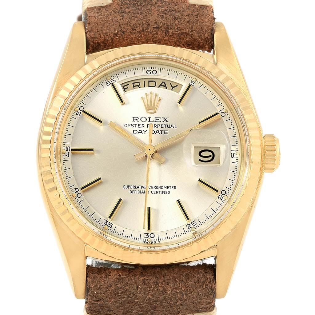 The image shows a front view of the Rolex Vintage Collection 1803 Men's Yellow Gold Silver Dial 1803 Men's Yellow Gold Silver Dial watch, highlighting the face, crown, and part of the strap.