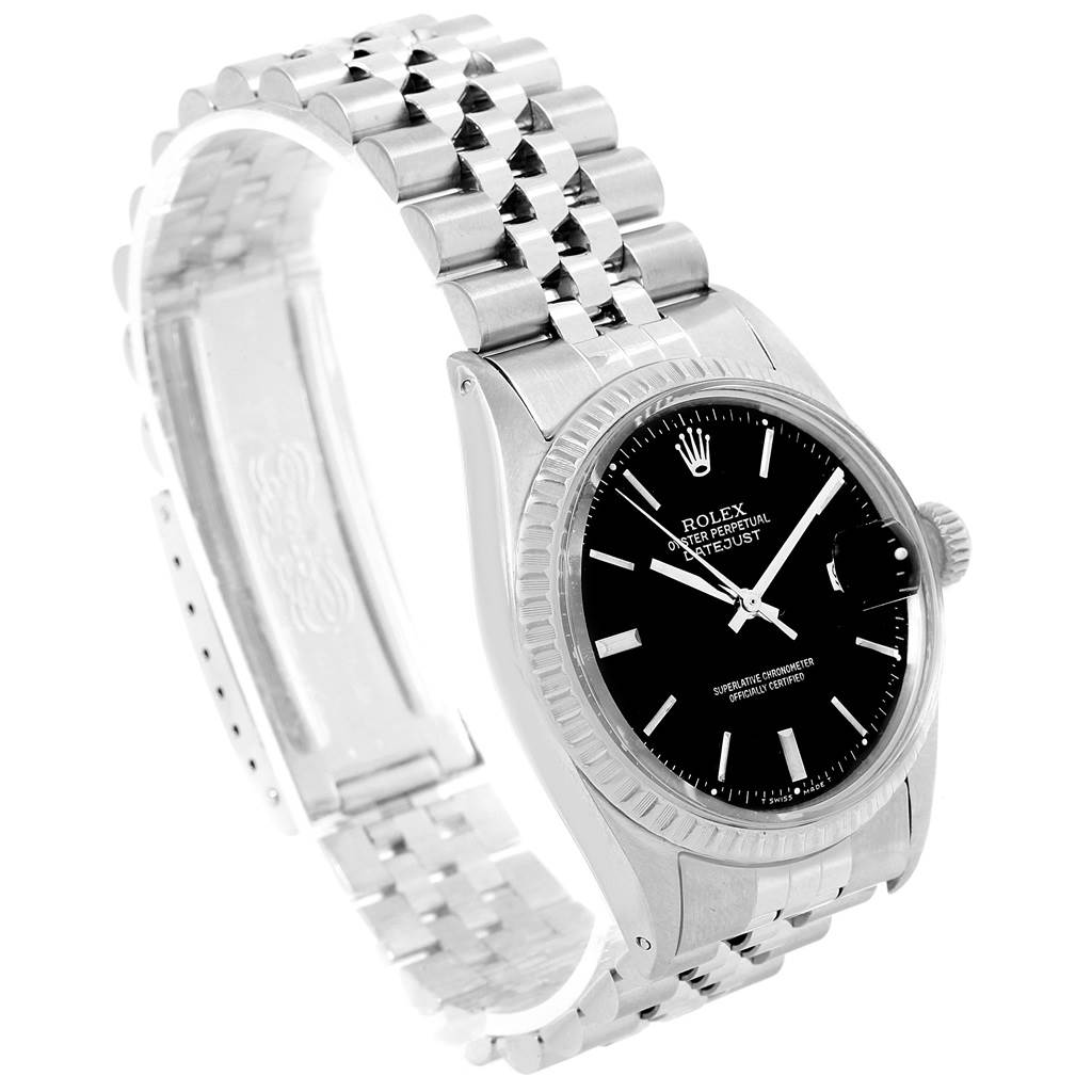 The image shows a side angle view of the Rolex Vintage Collection 1603 Men's Stainless Steel Black Dial 1603 Men's Stainless Steel Black Dial Datejust model, highlighting the dial, bezel, and bracelet.