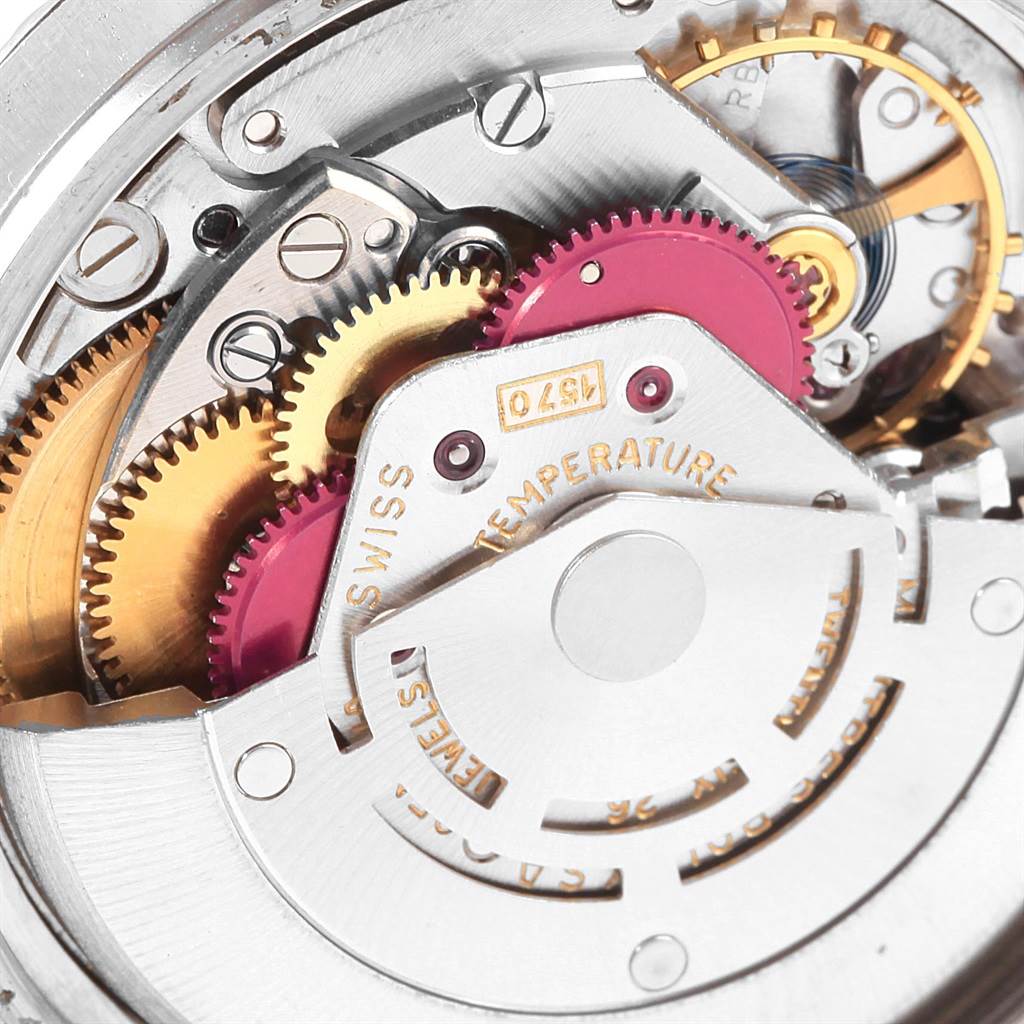 The image shows a close-up of the internal mechanisms and gears of the Rolex Vintage Collection 1603 Men's Stainless Steel Black Dial 1603 Men's Stainless Steel Black Dial watch.