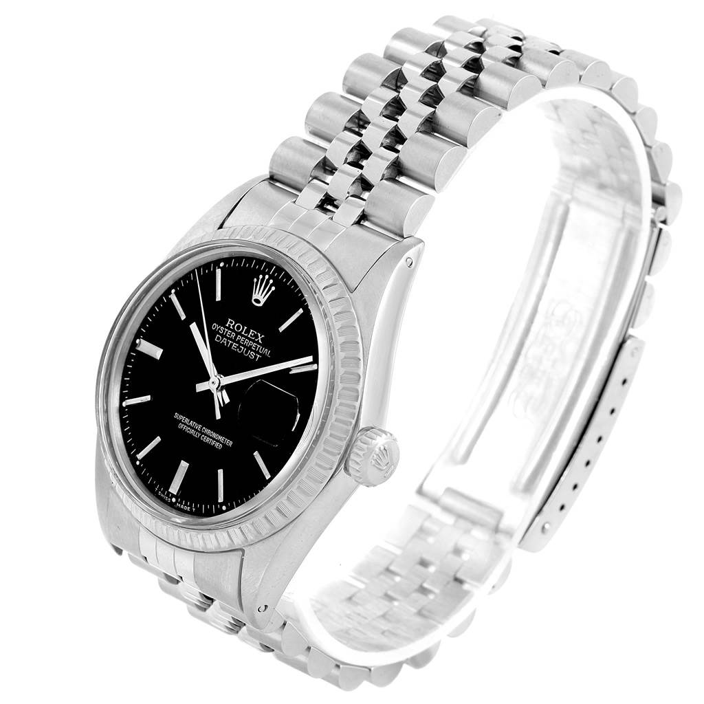 The image shows a Vintage Collection Rolex Datejust watch at an angle highlighting its face, bezel, crown, and bracelet.