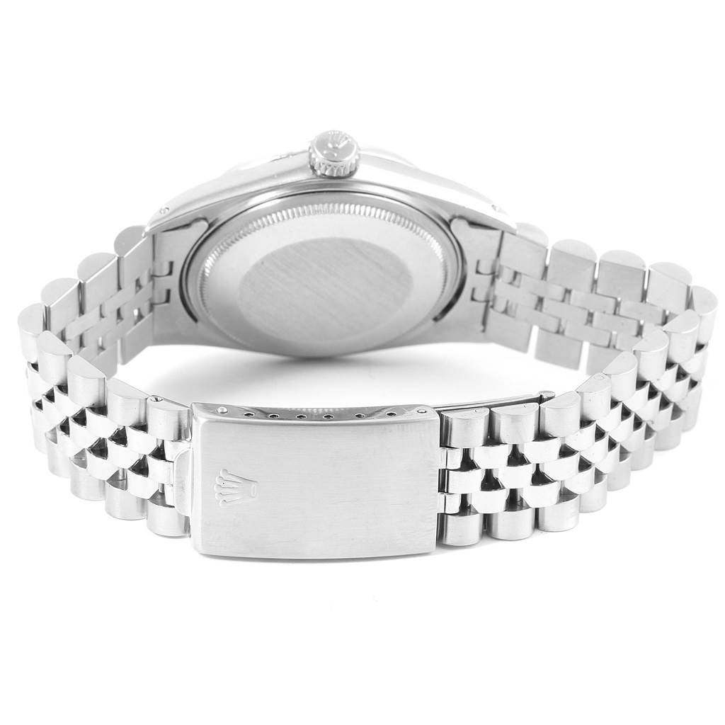 The image shows the back case and clasp of the Rolex Vintage Collection 1603 Men's Stainless Steel Black Dial 1603 Men's Stainless Steel Black Dial model watch.