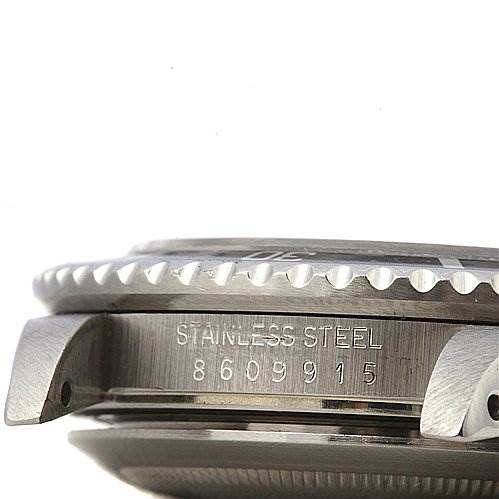 The image shows a side view of the case and lugs of the Rolex Vintage Collection 16800 Men's Stainless Steel Black Dial 16800 Men's Stainless Steel Black Dial watch, highlighting the stainless steel material and serial number.