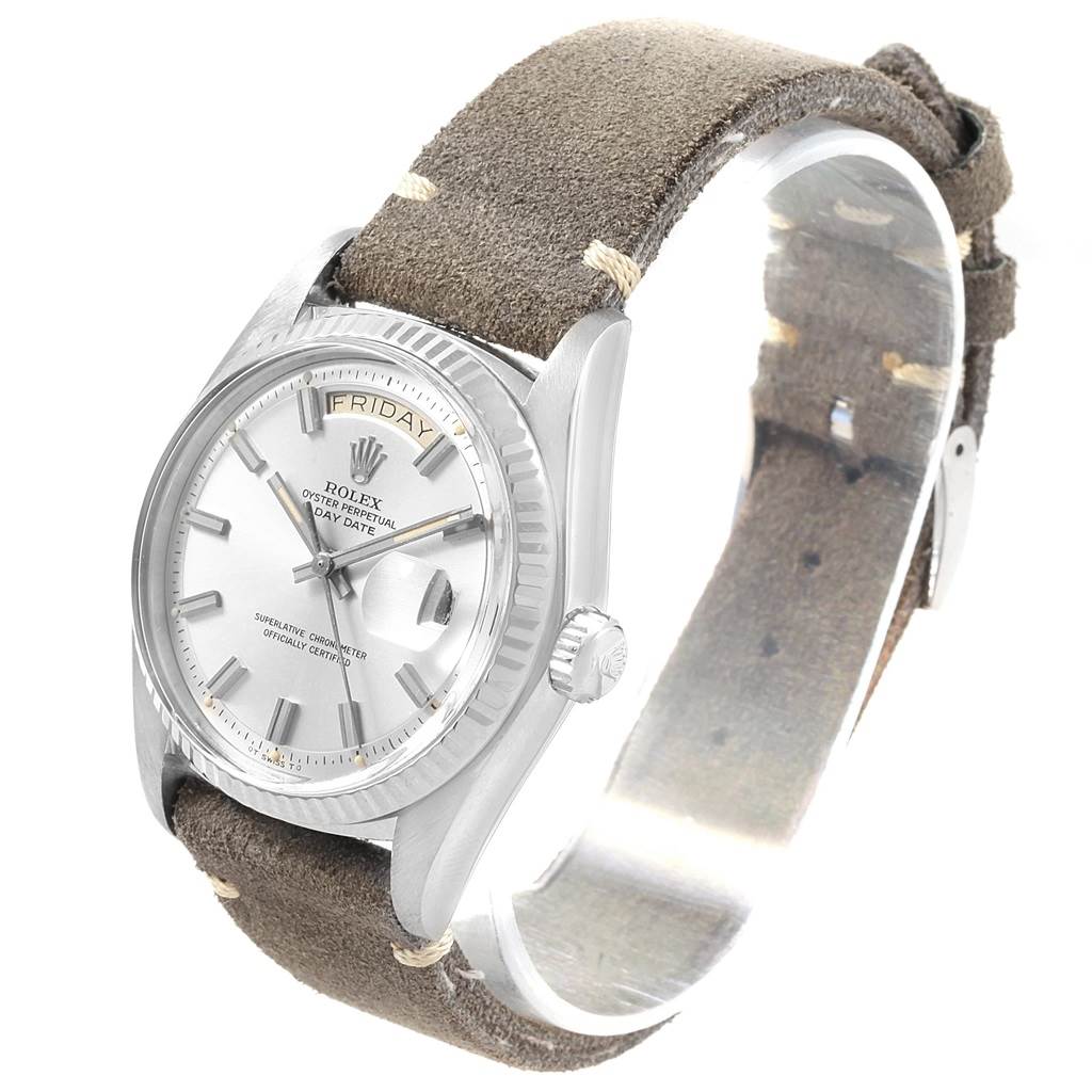 The Rolex Vintage Collection 1803 Men's White Gold Silver Dial 1803 Men's White Gold Silver Dial model is shown at a slight angle, displaying its face, crown, bezel, and suede strap.