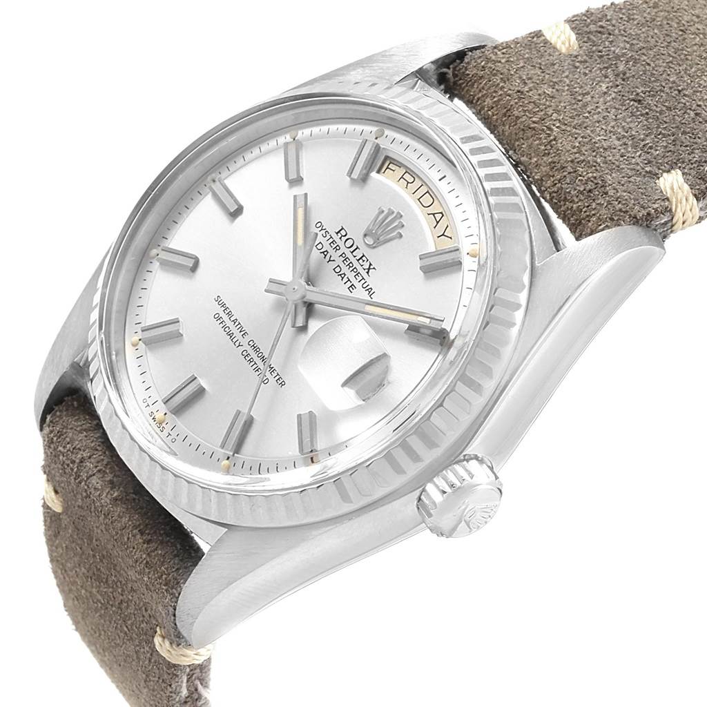 This image shows a side view of the Vintage Collection Rolex watch, highlighting the dial and crown with a leather strap.