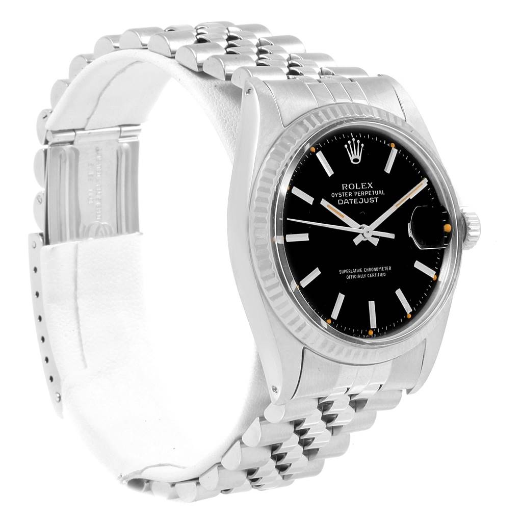 The image shows a side and front view of the Rolex Vintage Collection 1601 Men's Stainless Steel Black Dial 1601 Men's Stainless Steel Black Dial Oyster Perpetual Datejust, highlighting its case, dial, and bracelet.