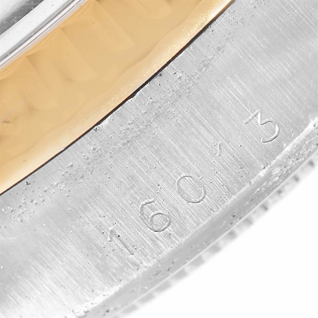 The image shows a close-up of the case side and serial number engraving of a Rolex Vintage Collection 16013 Men's Stainless Steel White Dial 16013 Men's Stainless Steel White Dial model watch.