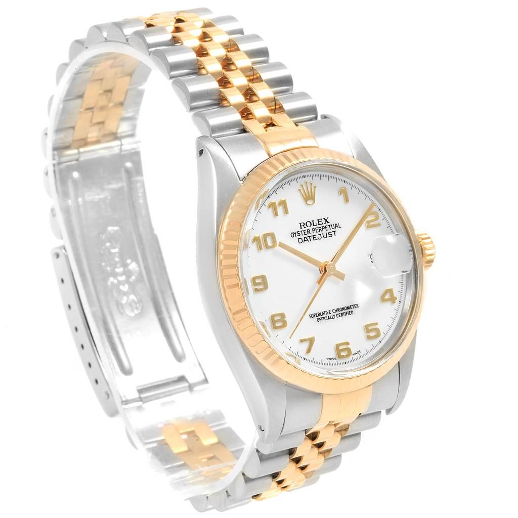 This image of the Vintage Collection Rolex watch showcases its face, band, crown, and clasp from a three-quarter angle.