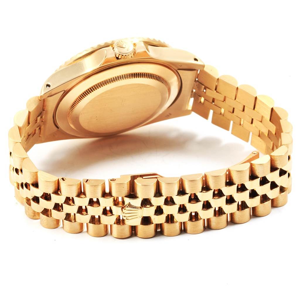 The image shows the back casing and bracelet of a Rolex Vintage Collection 16758 Men
s Yellow Gold Champagne Dial 16758 Men
s Yellow Gold Champagne Dial model watch from an angled, rear view.