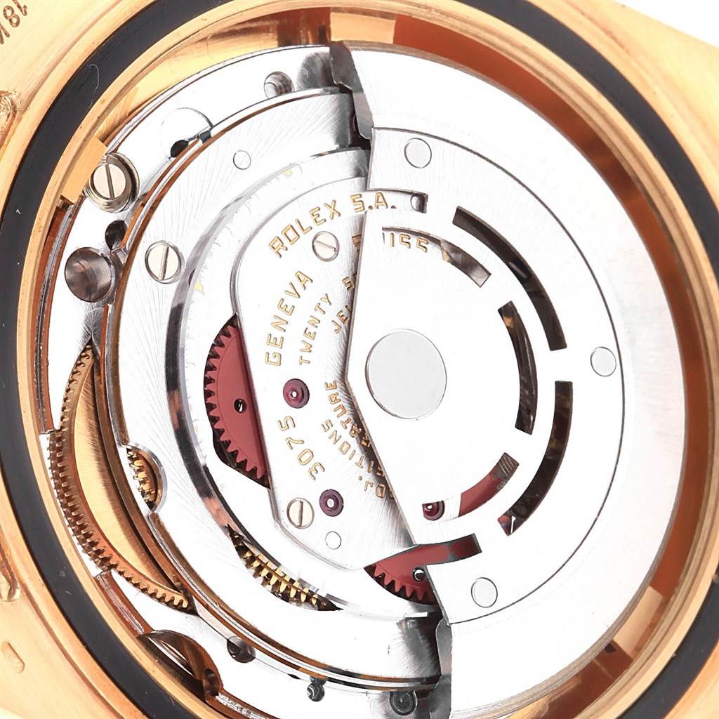 The image shows the internal mechanism and movement of the Rolex Vintage Collection 16758 Men
s Yellow Gold Champagne Dial 16758 Men
s Yellow Gold Champagne Dial watch from a rear perspective.