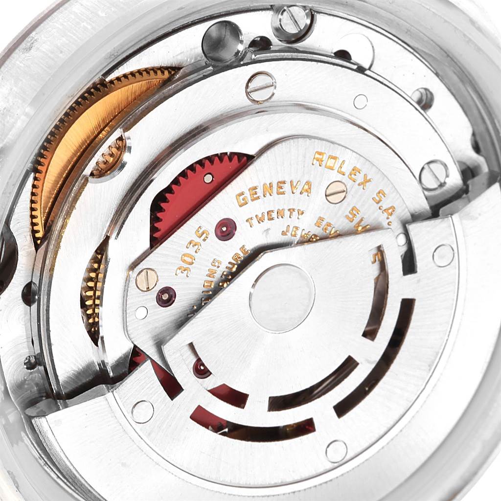 This image shows the inner mechanical movement parts of the Vintage Collection watch by Rolex from a close-up angle.