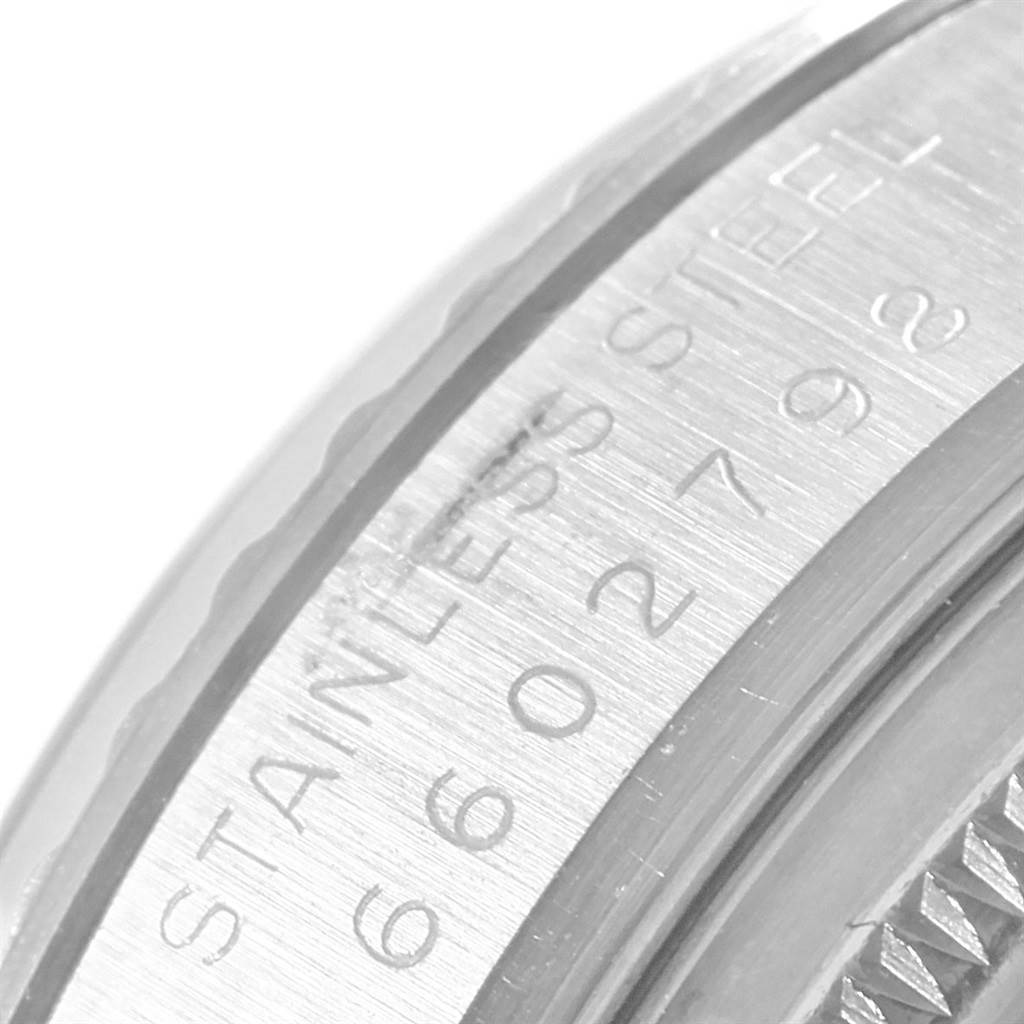 This image shows a close-up of the side engraving and outer edge of a Rolex Vintage Collection 16030 Men
s Stainless Steel Grey Dial 16030 Men
s Stainless Steel Grey Dial model in stainless steel.