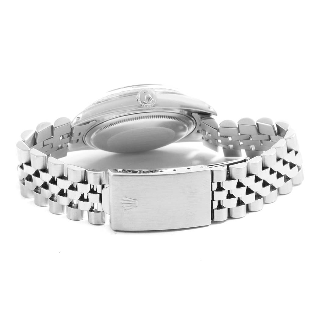 The image shows the back view of a Vintage Collection Rolex watch, highlighting the clasp and bracelet.