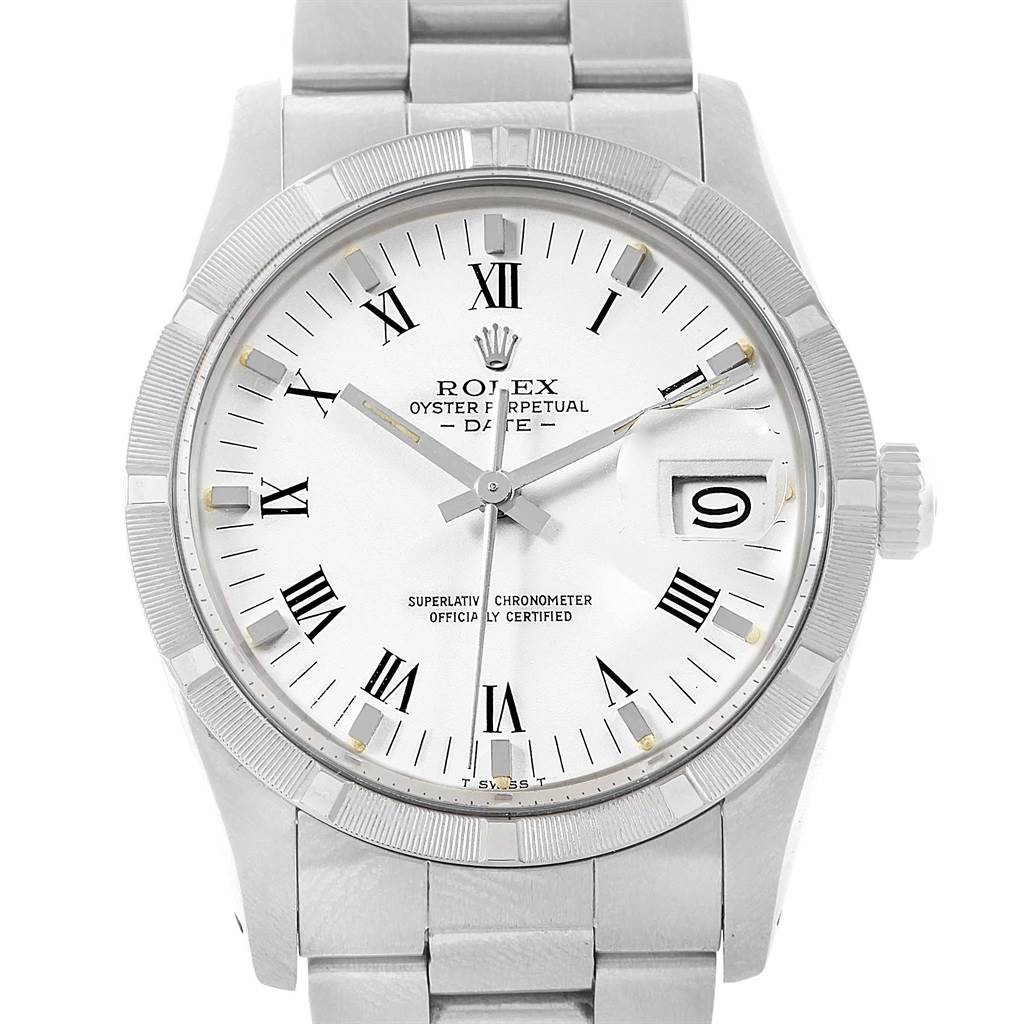 The image shows a Rolex Vintage Collection 15010 Men's Stainless Steel White Dial 15010 Men's Stainless Steel White Dial model watch with a silver case, Roman numeral dial, date window, and silver bracelet.