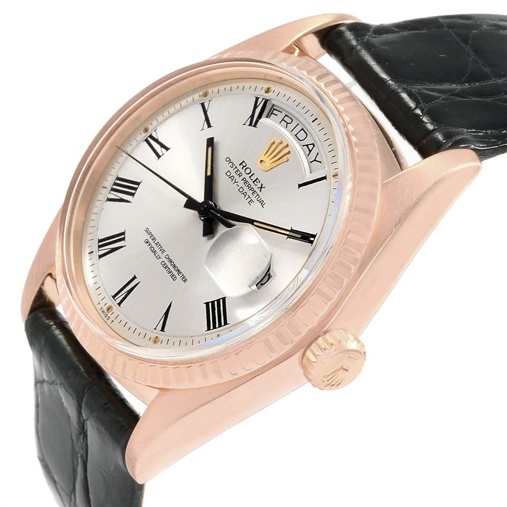 The image shows a side angle of the Rolex Vintage Collection 1803 Men's Rose Gold Silver Dial 1803 Men's Rose Gold Silver Dial watch, highlighting the dial, crown, and portion of the leather strap.