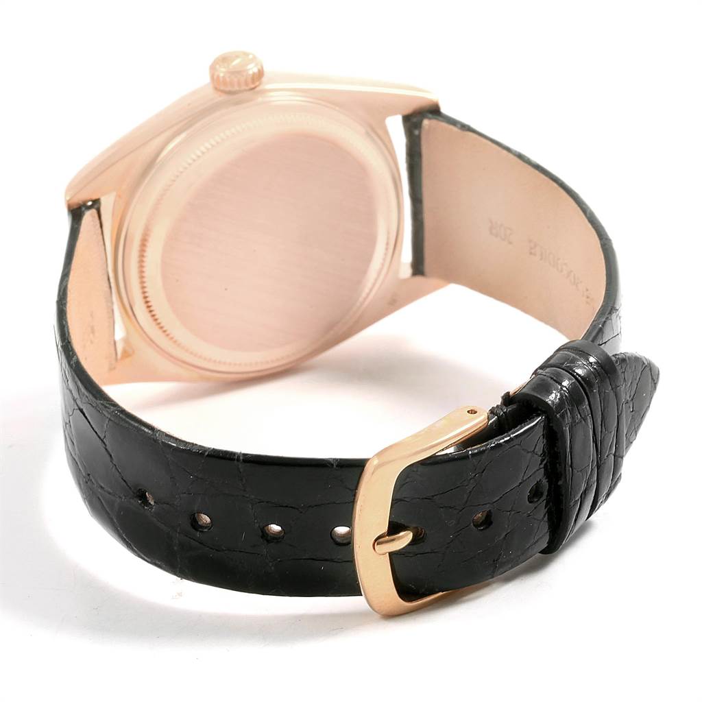 The image shows the back case, crown, and leather strap of a Rolex Vintage Collection 1803 Men's Rose Gold Silver Dial 1803 Men's Rose Gold Silver Dial watch.