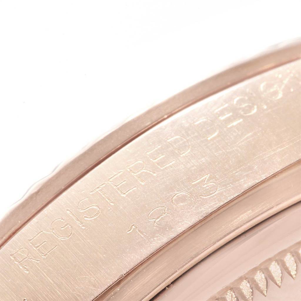 The image shows a close-up angle of the engraved side of a Vintage Collection Rolex watch.