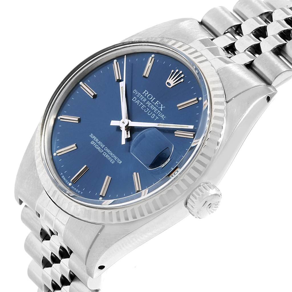 The Rolex Vintage Collection 16014 Men's Stainless Steel Blue Dial 16014 Men's Stainless Steel Blue Dial model is shown at an angle displaying its blue dial, fluted bezel, date window, and jubilee bracelet.