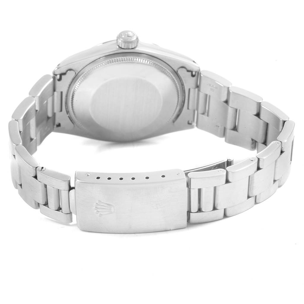 The image shows the backside and clasp of the Rolex Vintage Collection 1500 Men's Stainless Steel Black Dial 1500 Men's Stainless Steel Black Dial watch, highlighting the case back and bracelet details.