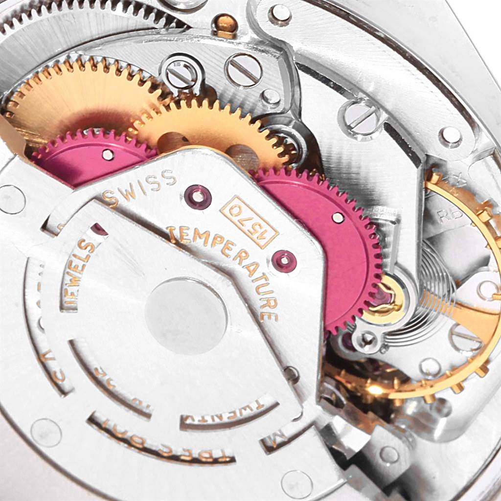 This image shows a close-up of the internal gears and mechanisms of the Rolex Vintage Collection 1500 Men's Stainless Steel Black Dial 1500 Men's Stainless Steel Black Dial model watch.