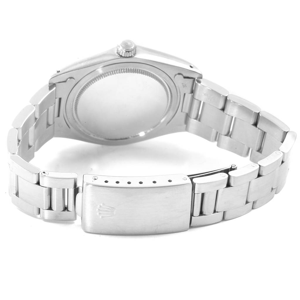 The image shows the back view of a Rolex Vintage Collection 6694 Men's Stainless Steel White Dial 6694 Men's Stainless Steel White Dial watch, focusing on the case back and bracelet clasp.