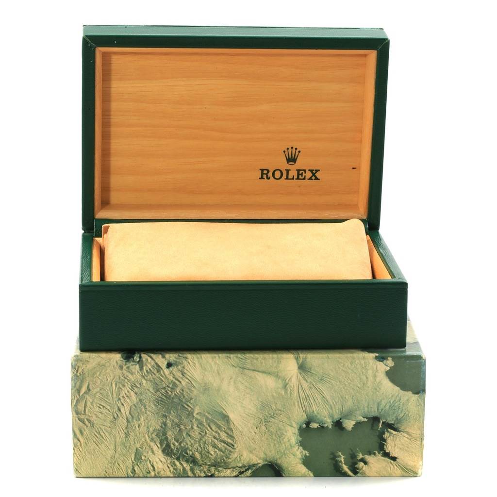 The image shows an open Rolex watch box from the Vintage Collection model, showcasing the inner cushioned compartment.