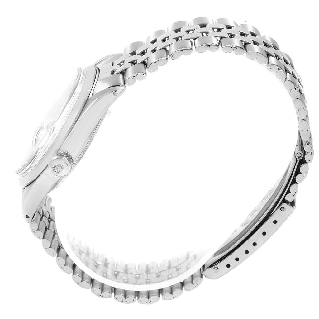 The image shows a side view of the band and case of a Rolex Vintage Collection 1600 Men's Stainless Steel Silver Dial 1600 Men's Stainless Steel Silver Dial watch.