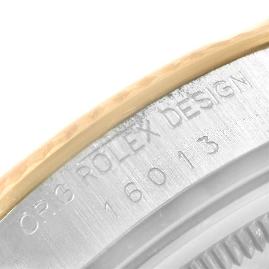 The image shows a close-up of the side of a Rolex Vintage Collection 16013 Men's Stainless Steel Silver Dial 16013 Men's Stainless Steel Silver Dial model, highlighting the engraved model number "16013."