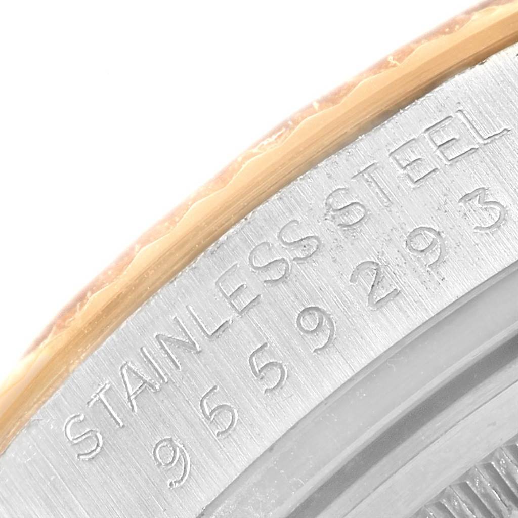 The image shows a close-up angle of the serial number and "STAINLESS STEEL" engraving on a Rolex Vintage Collection 16013 Men's Stainless Steel Silver Dial 16013 Men's Stainless Steel Silver Dial watch.